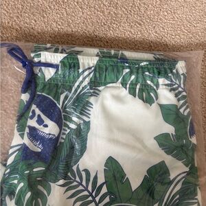 Men’s Jurassic World Tropical Leaf Print Swim Shorts. New with tags in bag